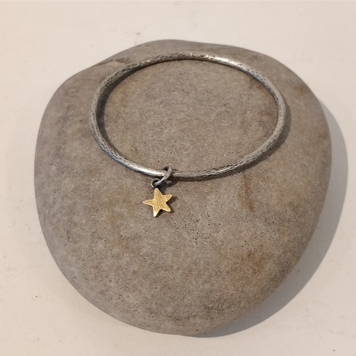 Gold star and silver Bangle